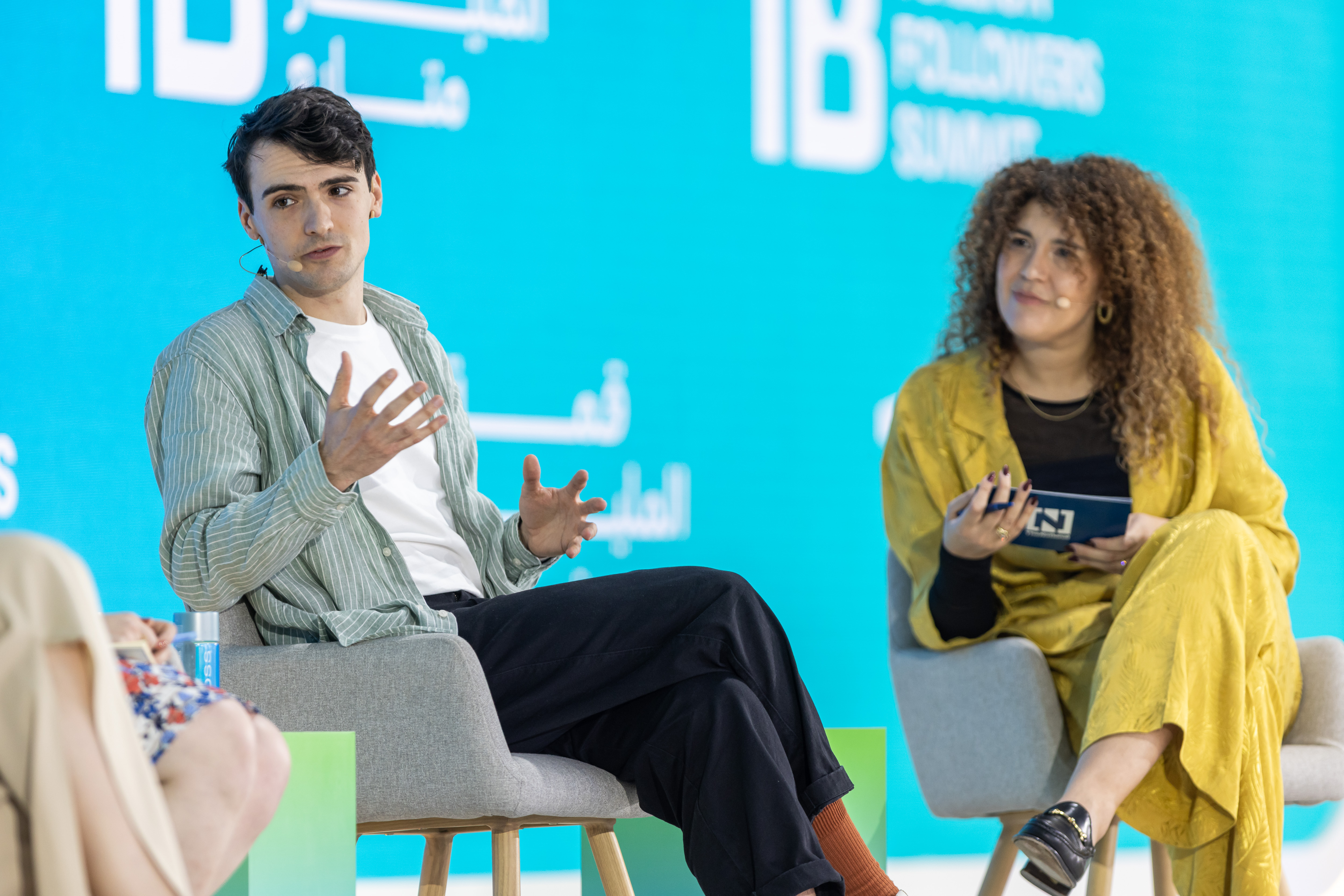 Panel discussion with fellow journalists on stage